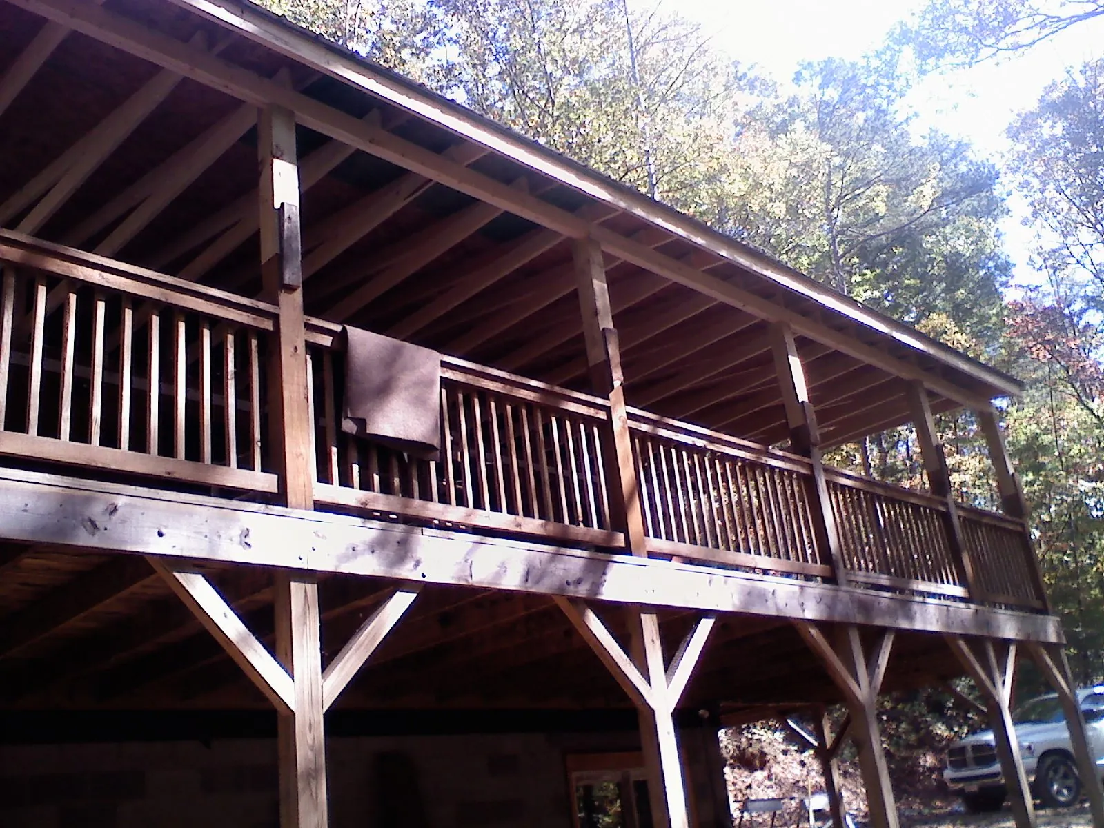 Timber framing under a new elevated porch and deck — Roof Leak Repair in Sprague River by Roofing Brothers